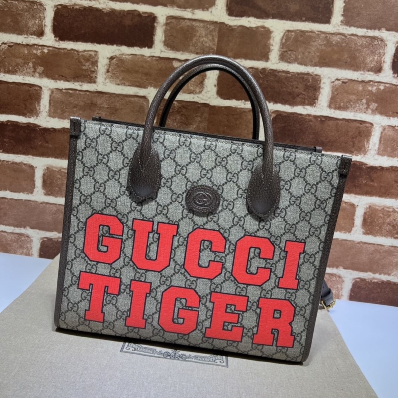 G*u*i shopping bags